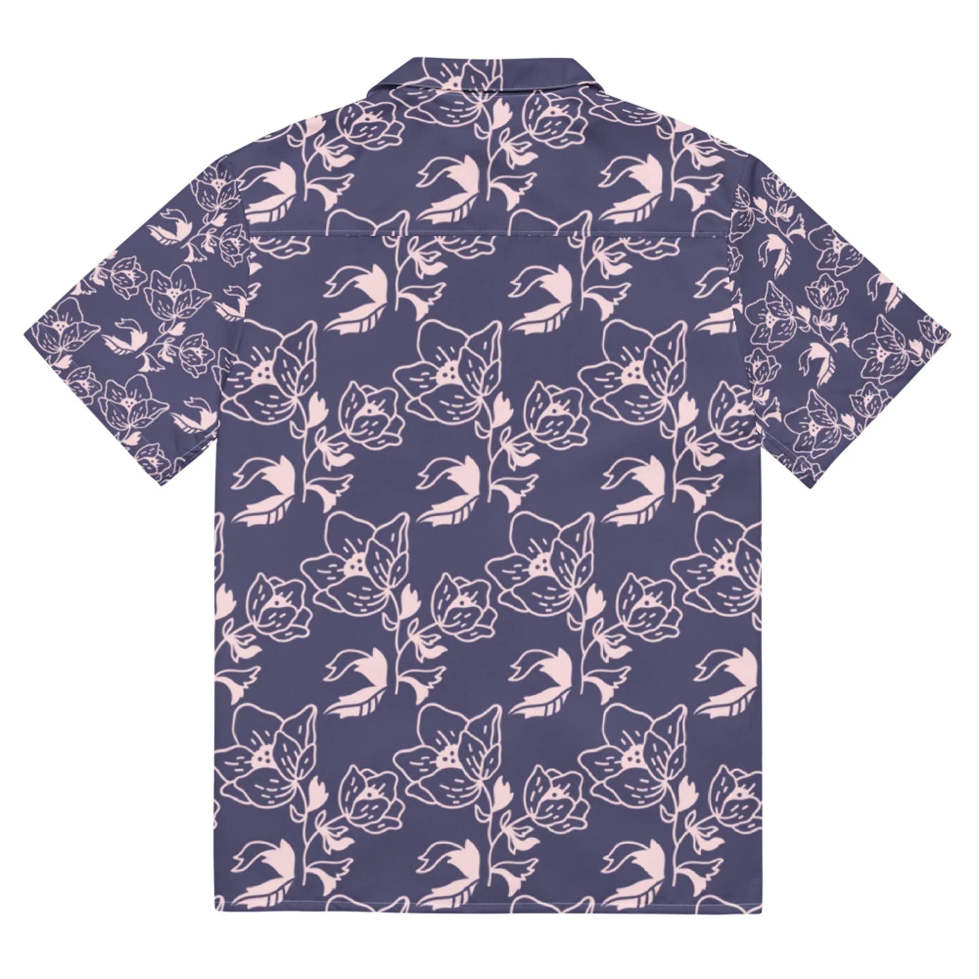 Short-sleeve button-up shirt with a dark purple background and light pink floral and cat face pattern, shown from the back. A unique Mambí style adds flair to this playful design.