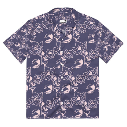 A Mambí short-sleeve button-up shirt with a dark purple background and a light pink floral pattern featuring abstract flowers and leaves.