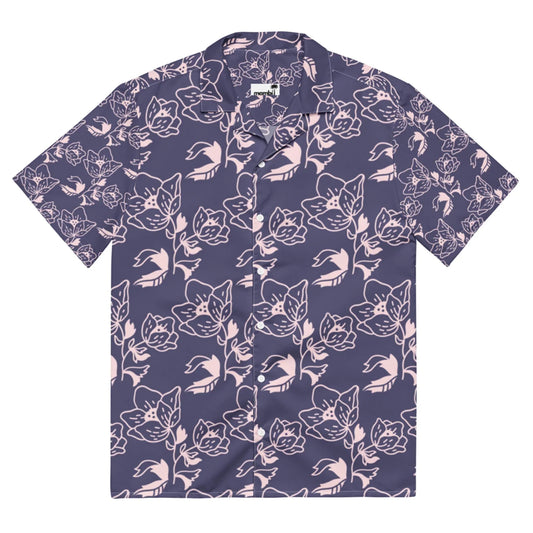 A Mambí short-sleeve button-up shirt with a dark purple background and a light pink floral pattern featuring abstract flowers and leaves.