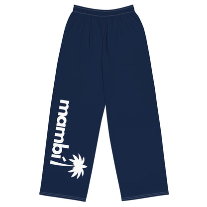 Navy blue pants featuring Mambí in bold white letters vertically on one leg, above a white palm tree graphic.