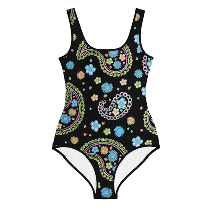 One-piece swimsuit with a black background featuring a colorful Mambí paisley and floral pattern in pastel blue, green, pink, and yellow tones. The design covers the entire swimsuit.