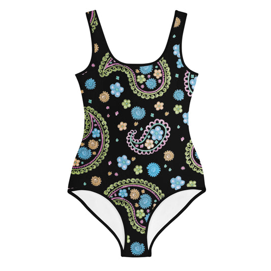 One-piece swimsuit with a black background featuring a colorful Mambí paisley and floral pattern in pastel blue, green, pink, and yellow tones. The design covers the entire swimsuit.