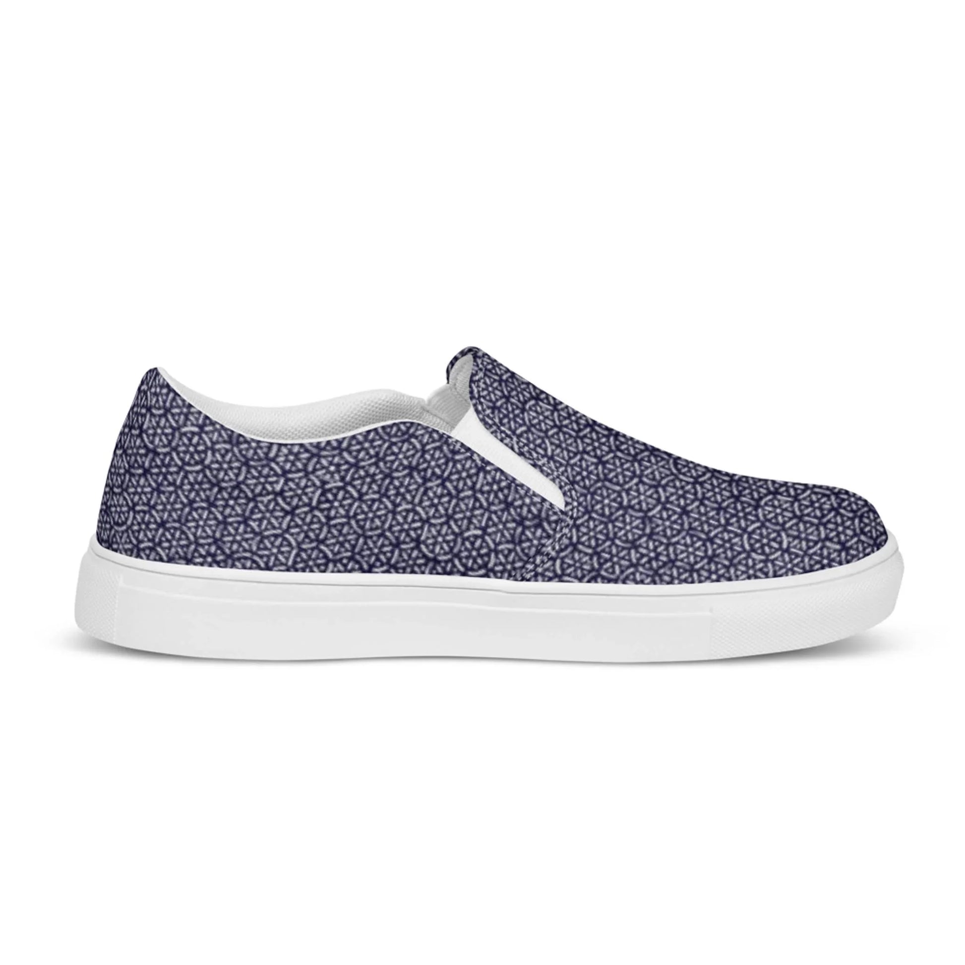 The Digno Handmade Slip-On Canvas Shoes for men by Printful feature a navy blue canvas, white sole, and a geometric hexagon and triangle pattern—making them the perfect fashion statement for any casual outfit.
