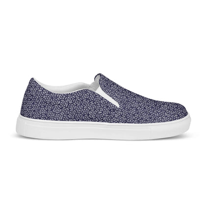 The Digno Handmade Slip-On Canvas Shoes for men by Printful feature a navy blue canvas, white sole, and a geometric hexagon and triangle pattern—making them the perfect fashion statement for any casual outfit.