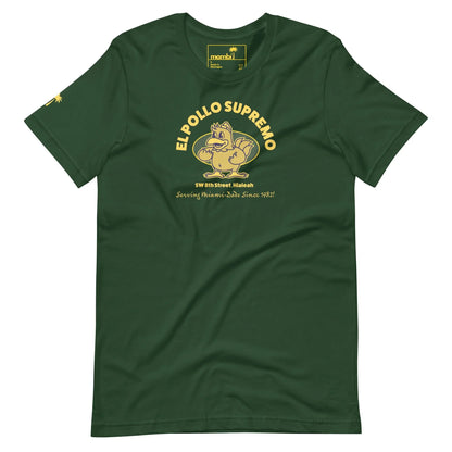 A dark green t-shirt featuring a cartoon chicken flexing its arm with EL POLLO SUPREMO above. Below, smaller text says SW 8th Street, Hialeah. A true Mambí classic since 1987.