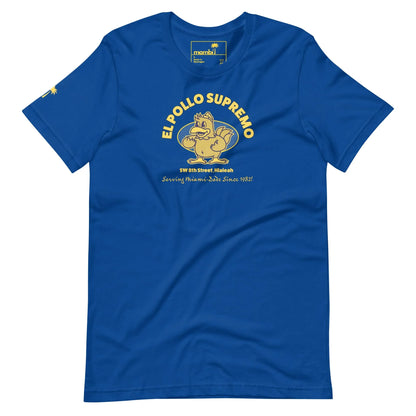 Blue t-shirt featuring a cartoon chicken flexing its arm, with the text EL POLLO SUPREMO above it and SW 8th Street, Hialeah. Celebrating Mambí pride, “Serving House-Made Diso Since 1982” is printed below in yellow.