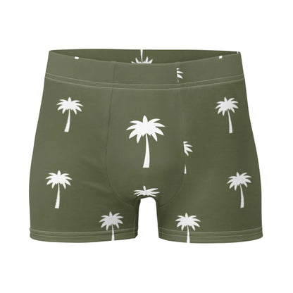 The Emerson Boxer Brief for men by Printful features an olive green color with white palm tree prints, a seamless fit, and is shown against a plain white background.
