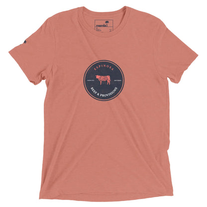 Light red short-sleeve t-shirt featuring a circular navy logo with a cow and the text ESPINOSA BEEF & PROVISIONS at the center. The neck label highlights Mambí.