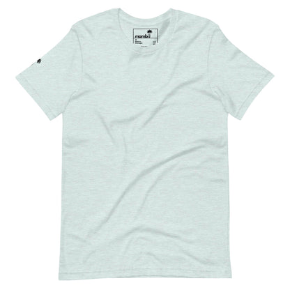 A plain light gray short-sleeve t-shirt is displayed on a white background. The shirt features a small black Mambí logo on the sleeve and a visible name tag inside the collar.