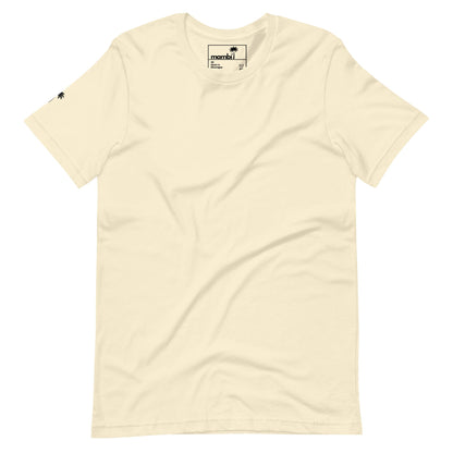 A plain, off-white short-sleeve t-shirt featuring a small black palm tree icon on the left sleeve and a visible tag inside the collar. The shirt is laid flat against a white background, showcasing its Mambí-inspired style.