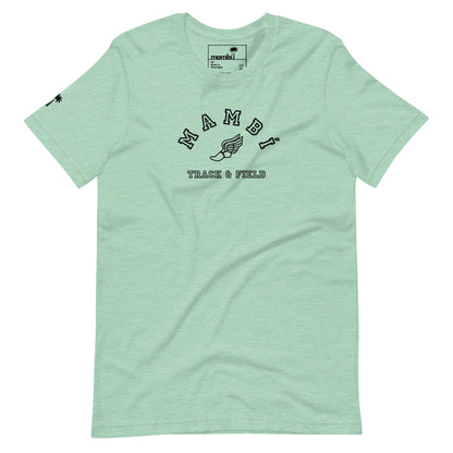 Light green t-shirt featuring Mambí in bold black arched text, a winged shoe graphic below, and TRACK & FIELD underneath. A small palm tree logo accents the left sleeve.