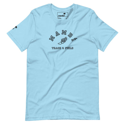 Light blue t-shirt featuring “Mambí” in black, curved above a winged shoe graphic. Below, it reads “TRACK & FIELD.” Includes a small logo on the left sleeve and an inner collar tag.