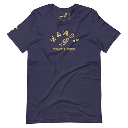 Navy blue t-shirt featuring Mambí in yellow arched text, a winged foot graphic, and TRACK & FIELD below. A small yellow palm tree accents the left sleeve.