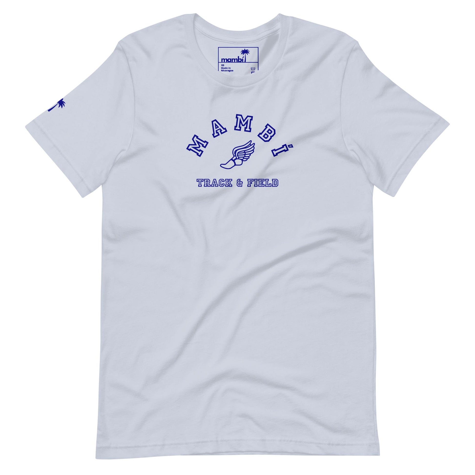 White t-shirt with Mambí in blue letters across the chest, a winged shoe graphic underneath, and TRACK & FIELD below. Features a small blue logo on the left sleeve and a branded tag on the collar.