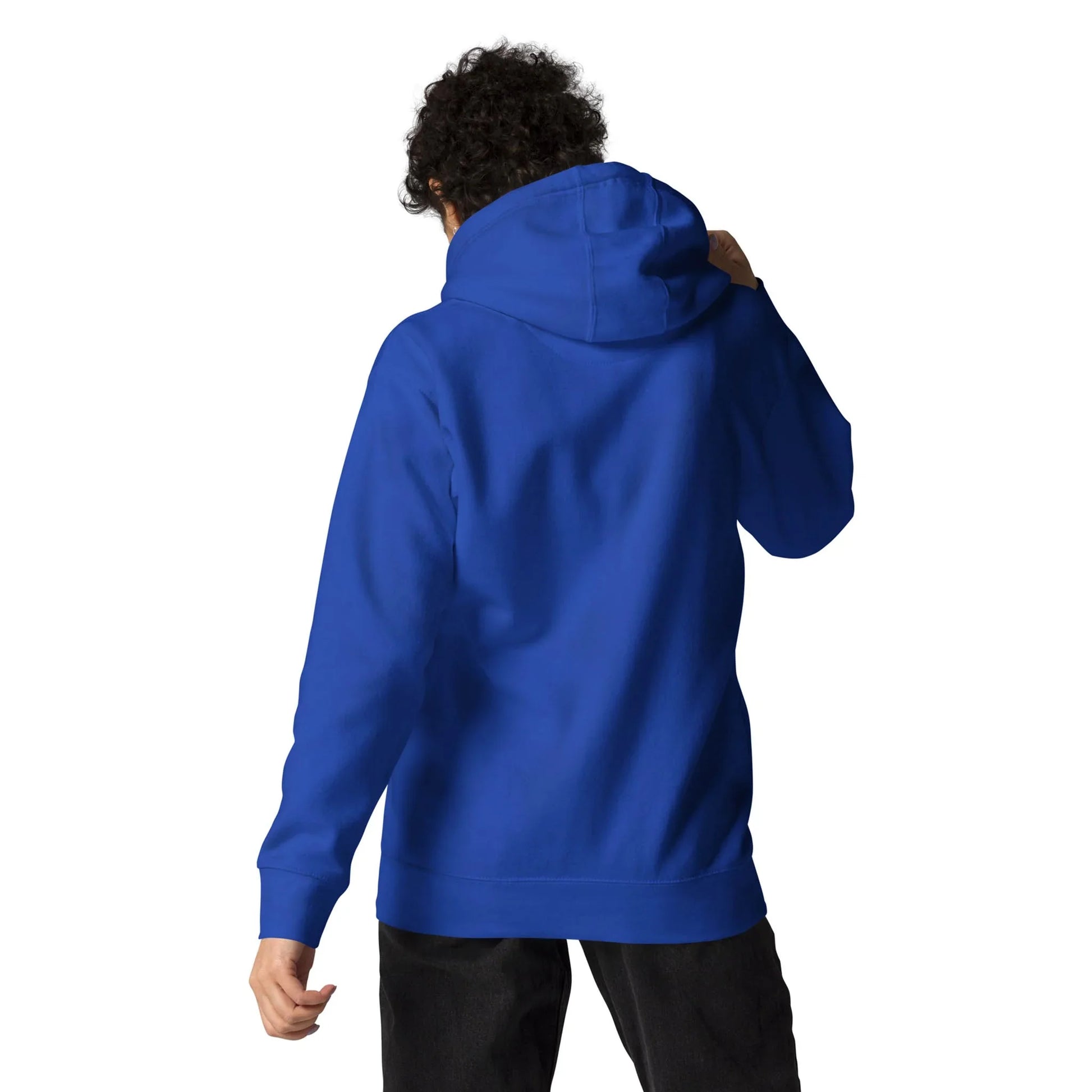 A person is shown from the back wearing a bright blue Mambí hooded sweatshirt and black pants against a plain white background.