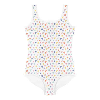 The Printful Gemma One-Piece Swimsuit for toddlers and little kids features a white, sleeveless design with rows of colorful hearts and offers UPF sun protection—ideal for stylish, safe fun in the sun.