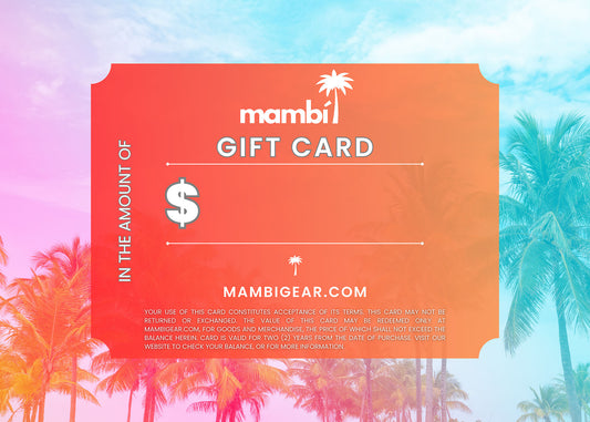 A colorful gift card for mambiGEAR.com with a palm tree motif, featuring GIFT CARD, a blank space for the dollar amount, and terms and conditions at the bottom.