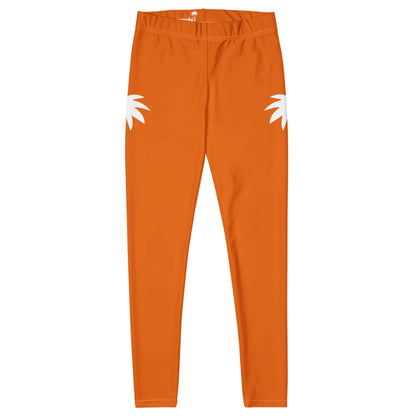 Orange leggings with a simple design, featuring two white, spiky shapes near the hip area on each side, showcased against a plain white background in the bold Mambí style.
