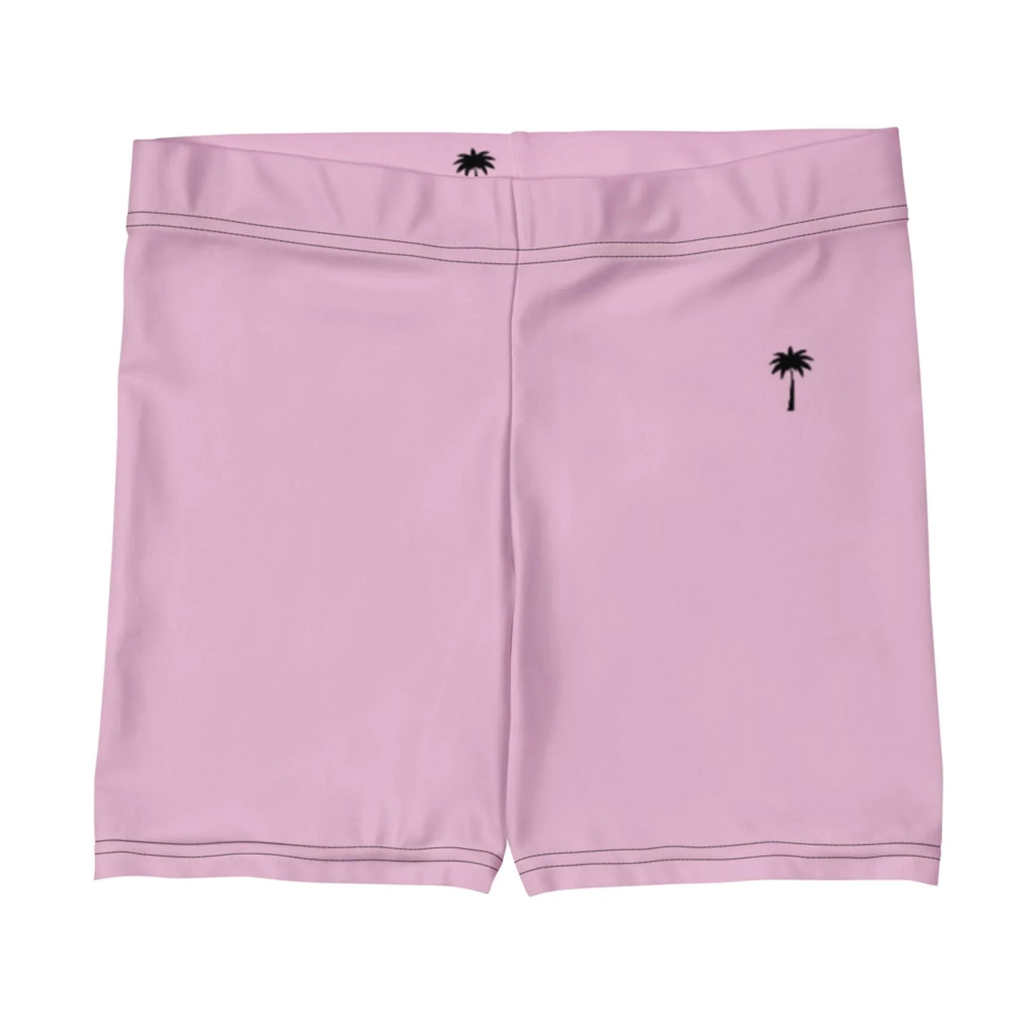 Light pink Mambí shorts featuring a simple black palm tree graphic on the left thigh and a smaller one near the waistband at the back. These shorts have minimalistic stitching and a sleek, streamlined design without visible pockets or drawstrings.