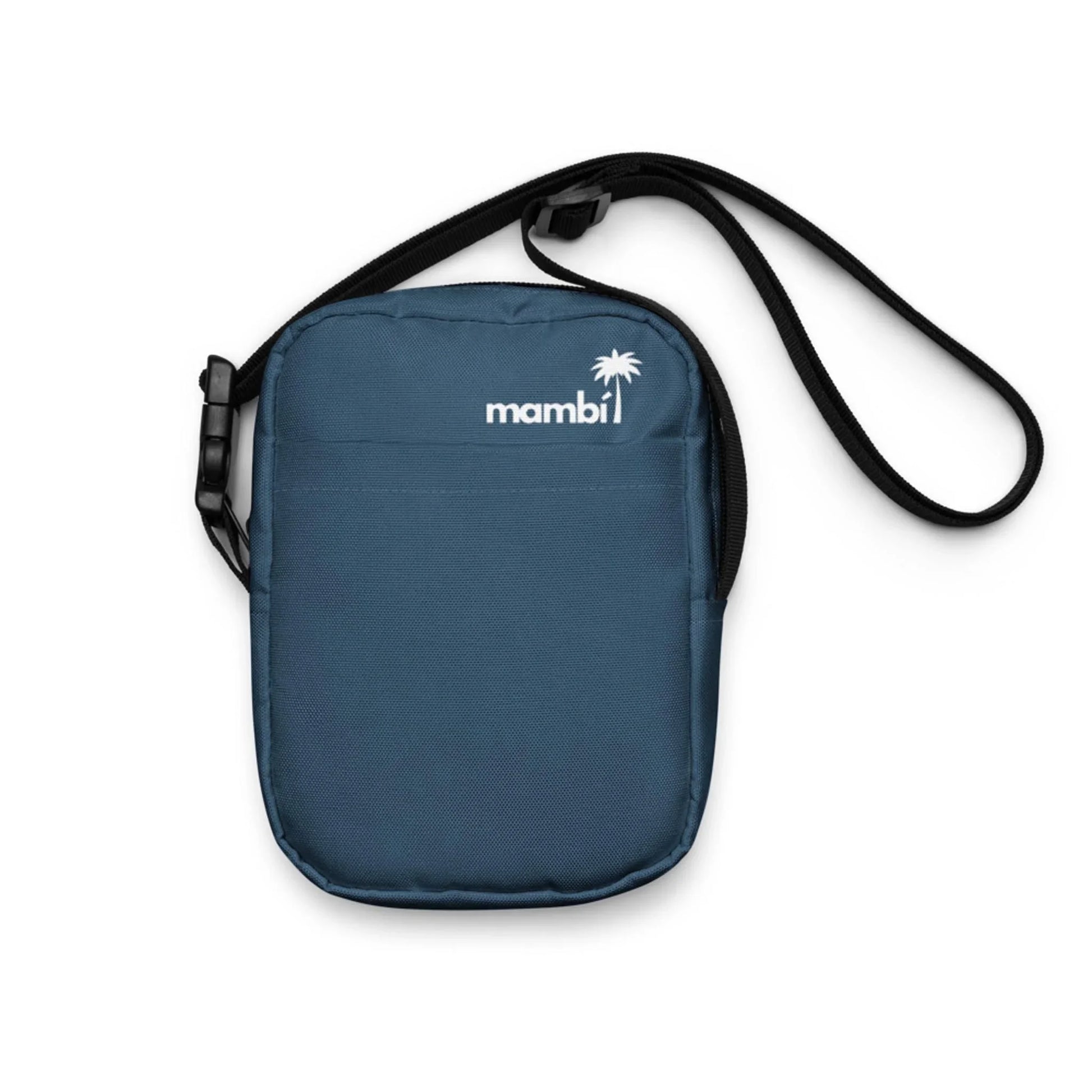 A small, navy blue Mambí crossbody bag with a black adjustable strap and a white mambi logo and palm tree graphic on the front. Features a zippered main compartment and a convenient front pocket.