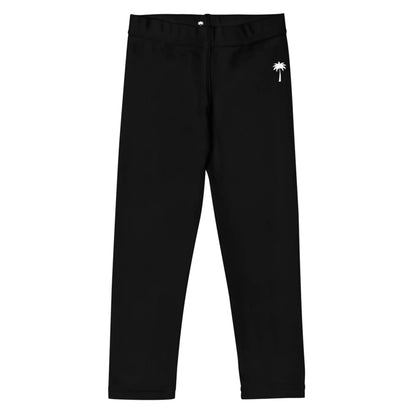 Black leggings with a small white palm tree graphic near the left hip, featuring subtle Mambí style, displayed on a plain white background.