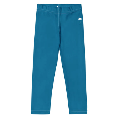 Blue Mambí leggings with a white palm tree graphic near the left hip, featuring visible white stitching along the waistband, hem, and seams. The leggings are displayed on a white background.