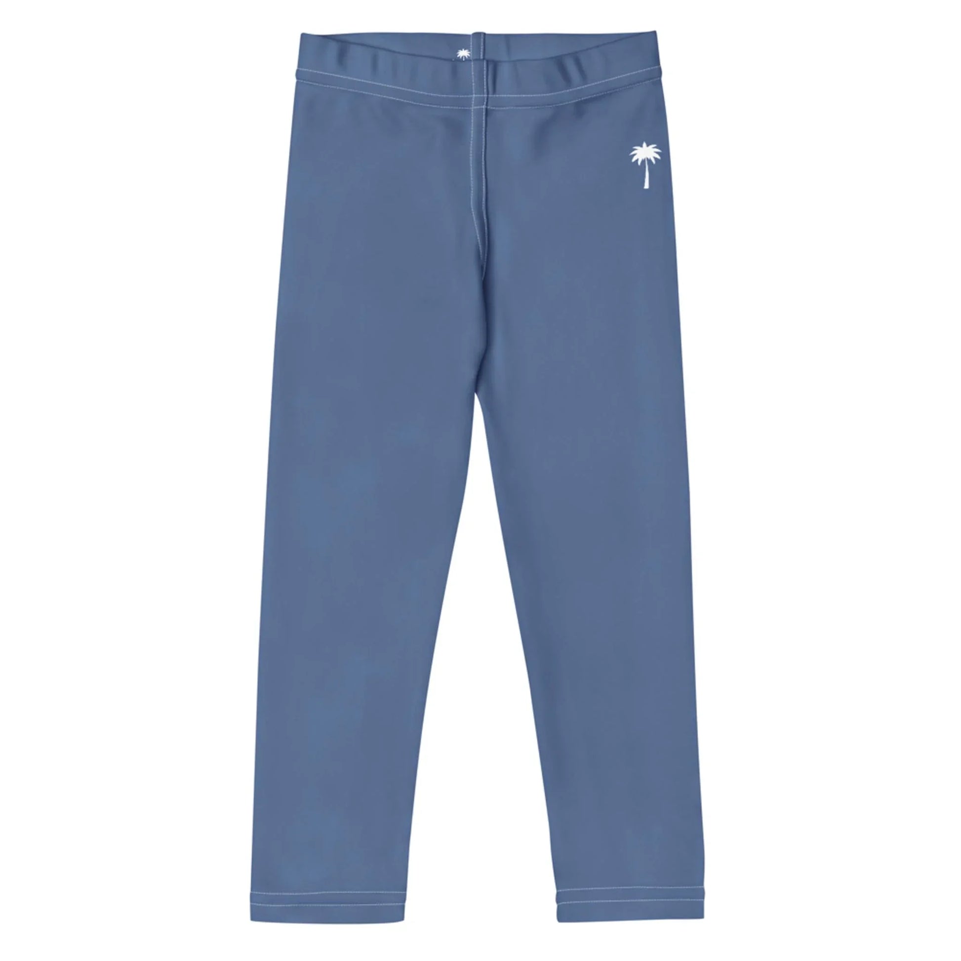 Blue Mambí leggings with a white palm tree graphic on the left hip, laid flat on a white background.