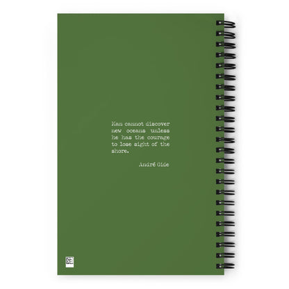 A green custom wire-bound notebook with a dotted paper interior features a centered quote in white: Man cannot discover new oceans unless he has the courage to lose sight of the shore. André Gide.