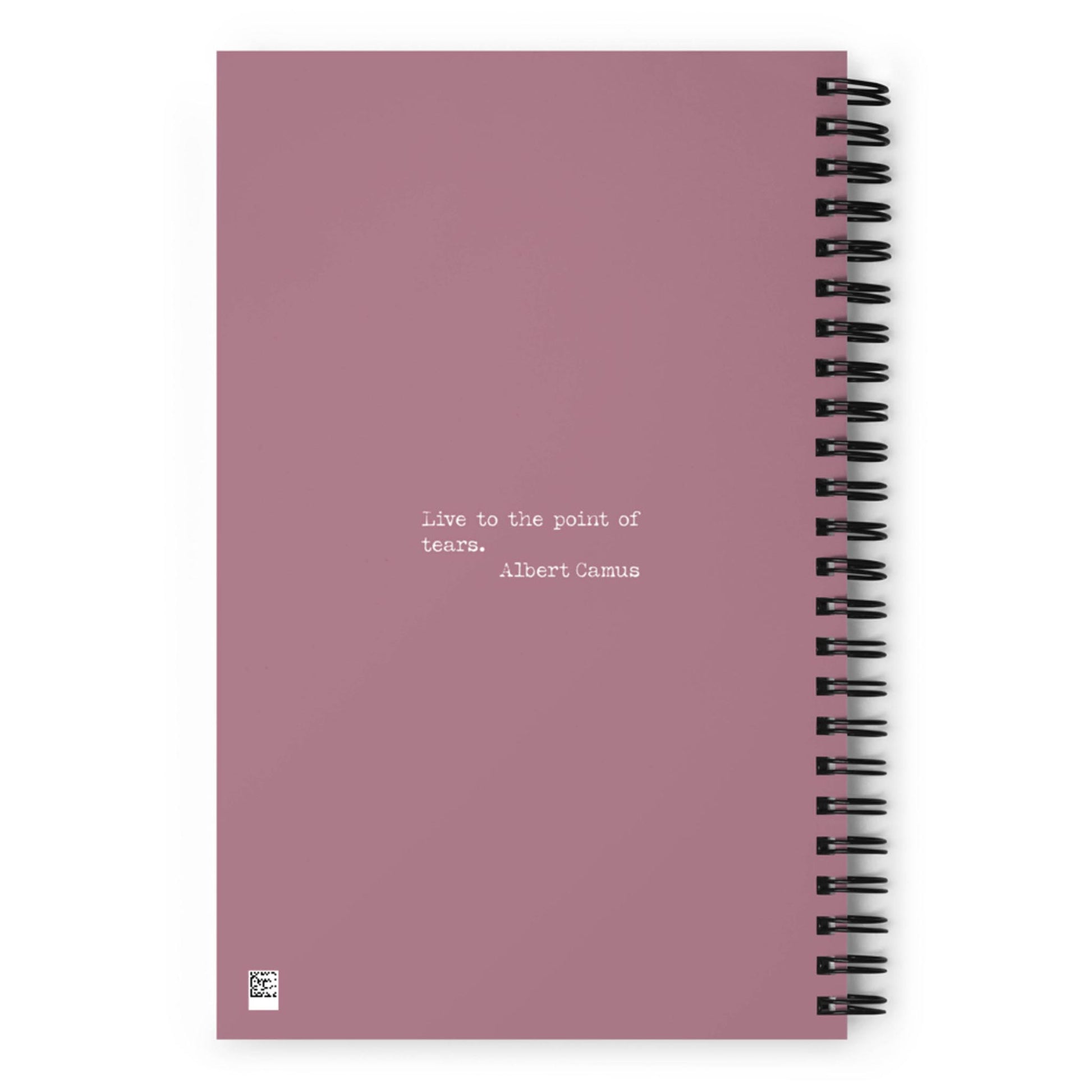 A mauve custom wire-bound notebook with the quote Live to the point of tears. Albert Camus printed in small white letters at the center. A small white square logo appears in the bottom left corner—perfect as your daily companion notebook.
