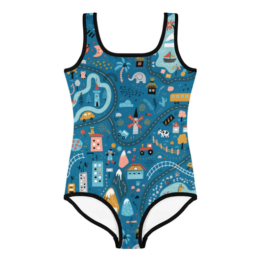 One-piece Mambí swimsuit with a whimsical map print featuring rivers, roads, houses, boats, trees, animals, mountains, and playful icons in vibrant colors on a dark blue background.