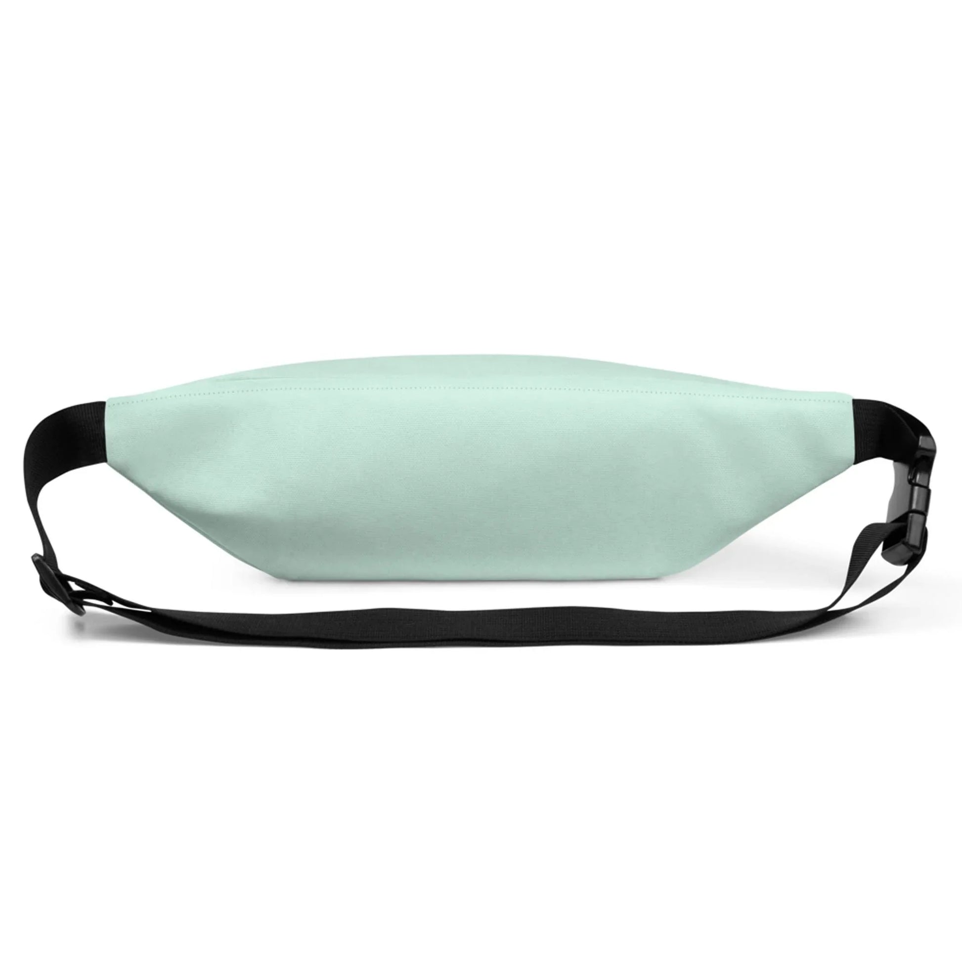 A light mint green Mambí fanny pack with a black adjustable strap and buckle, shown from the front on a white background.