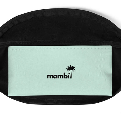 A close-up of an open black bag reveals a light green inner pocket with the word Mambí and a small black palm tree graphic printed above it.