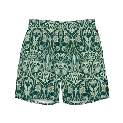 The Oz Swim Trunks by Printful feature an ornate, symmetrical vintage floral pattern in green and cream, with stylized vines and flowers. Made from water-repellent fabric for comfort in and out of the water.