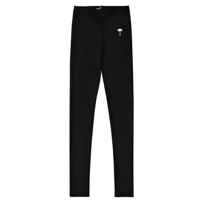 Black Mambí leggings featuring a small white palm tree graphic on the left hip, displayed against a plain white background.