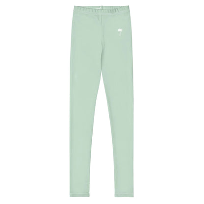 Light green high-waisted Mambí leggings with a small white palm tree graphic on the left hip, displayed on a plain white background.