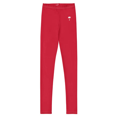Bright red Mambí leggings featuring a small white palm tree graphic on the left hip, displayed on a plain white background.
