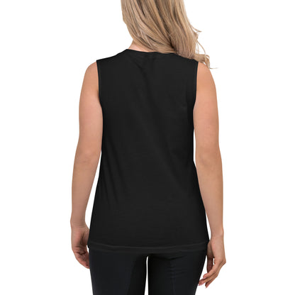 A woman with blonde hair, dressed in a black sleeveless tank and dark pants, is shown from the back as she stands against a white background.