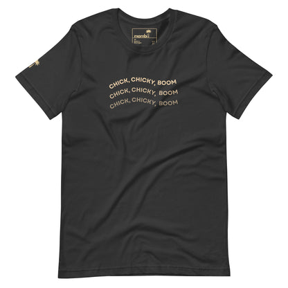 Dark grey fitted shirt with gold “CHICK, CHICKY, BOOM” text repeated three times on the chest. Made from comfortable cotton, this graphic tee also features a small palm tree logo on the left sleeve near the shoulder.