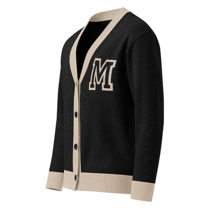 A stylish two-tone cardigan with black and beige trim, featuring a large white M patch on the left chest and button closure. This unisex cardigan is perfect for elevating any look.
