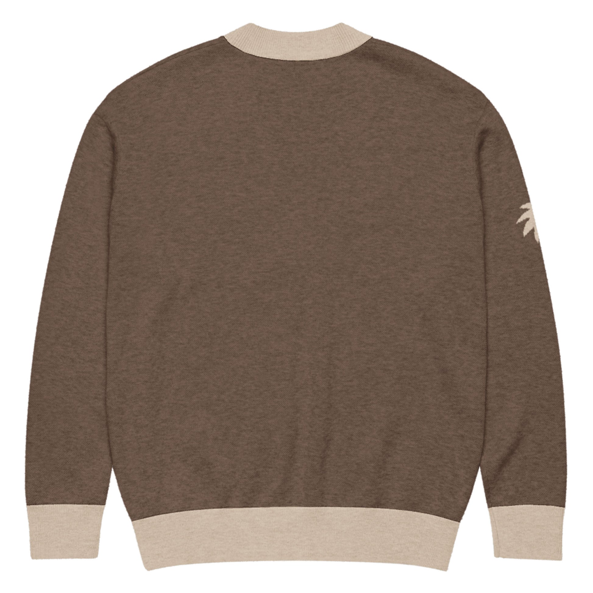A brown jacquard knit sweater with beige ribbed cuffs, collar, and hem, shown from the back. A small beige palm tree design accents the upper part of the left sleeve.