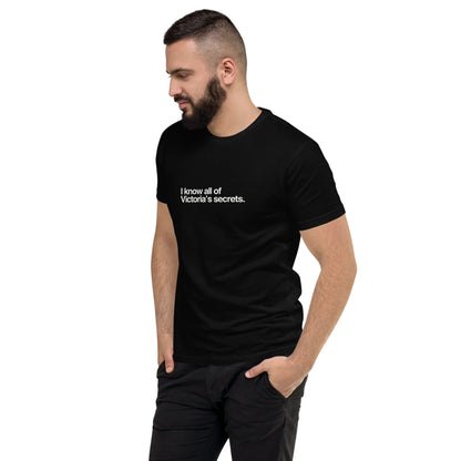 Man wearing a black t-shirt with text on a white background