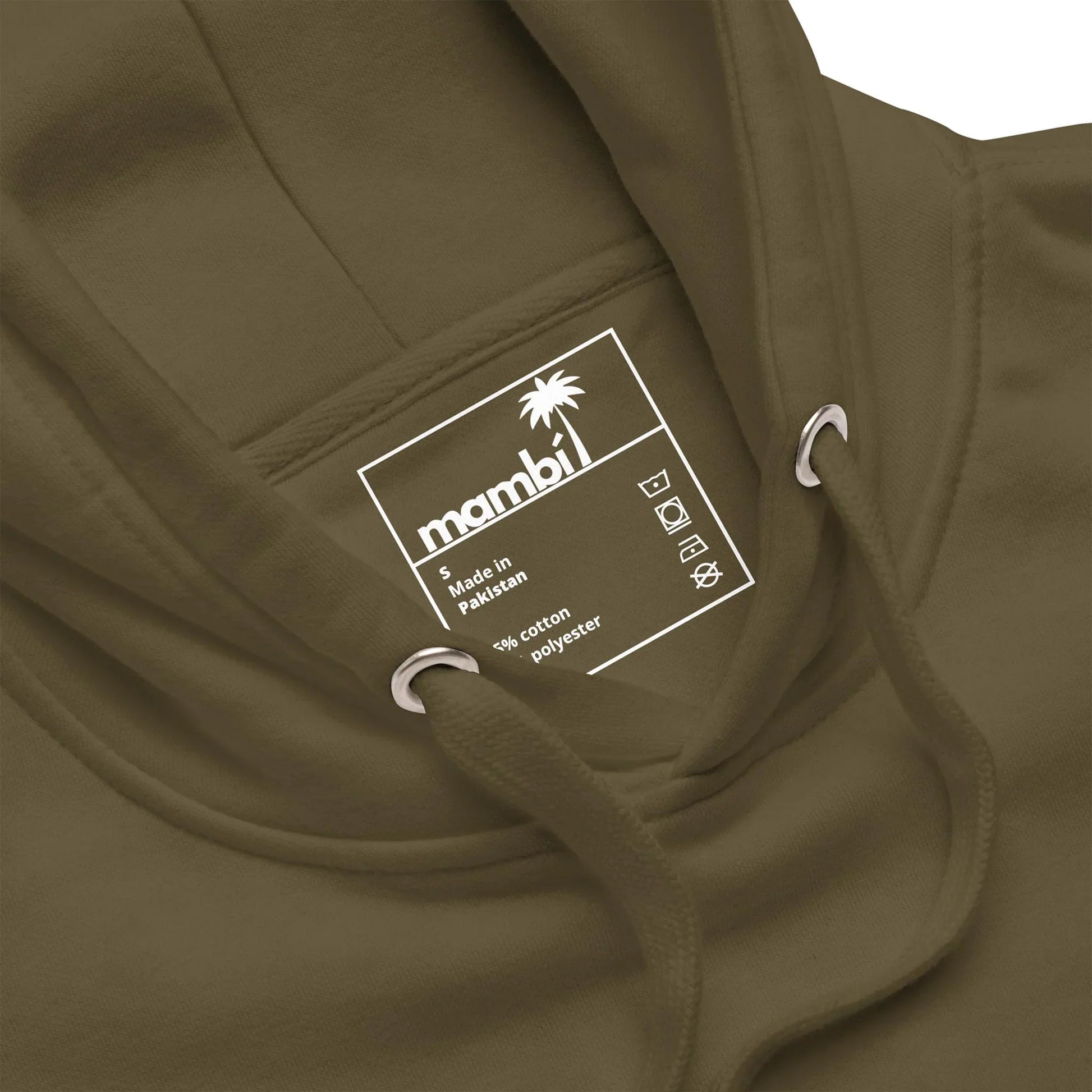 Close-up of an olive green Mambí hoodie with a white label inside the hood. The label features the mambi name, a palm tree logo, and lists material details: 80% cotton, 20% polyester, along with care symbols.
