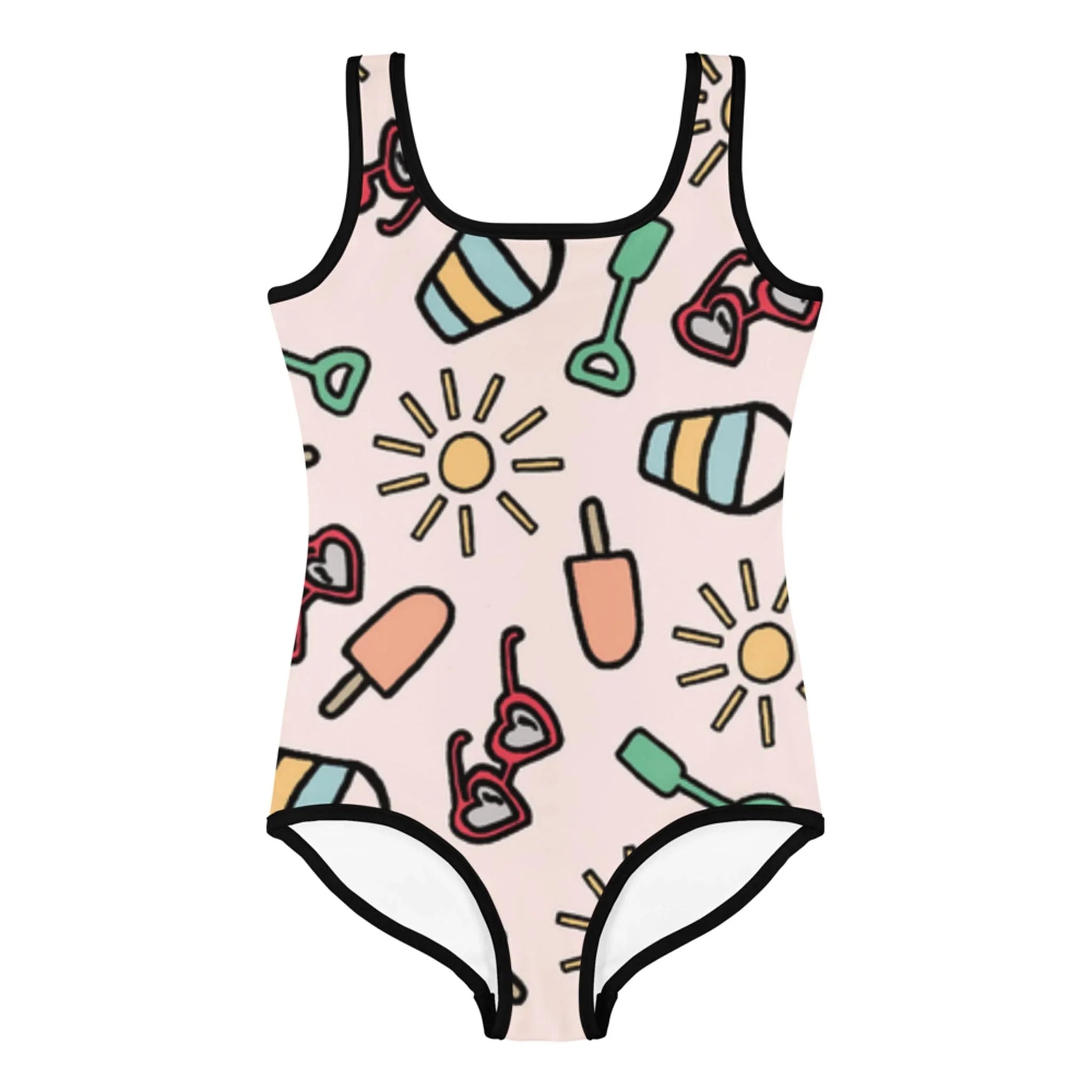 A one-piece swimsuit by Mambí with a light pink background featuring playful illustrations of suns, popsicles, heart-shaped sunglasses, beach balls, and green shovels, all outlined in black.