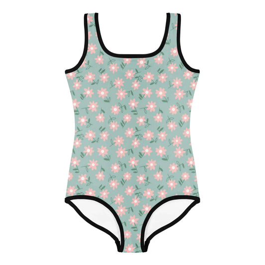 The Sara One-Piece Swimsuit by Printful for toddlers and little kids features vibrant pink and white daisy prints with green leaves on a light green background, black trim, and offers UPF sun protection for safe fun in the sun.