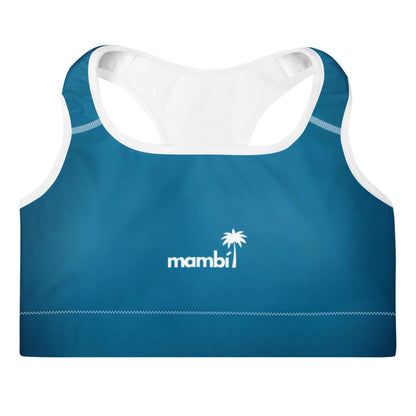 Blue sports bra with white interior lining, featuring the word Mambí and a palm tree logo in white on the front center. Racerback straps complete the look against a plain white background.