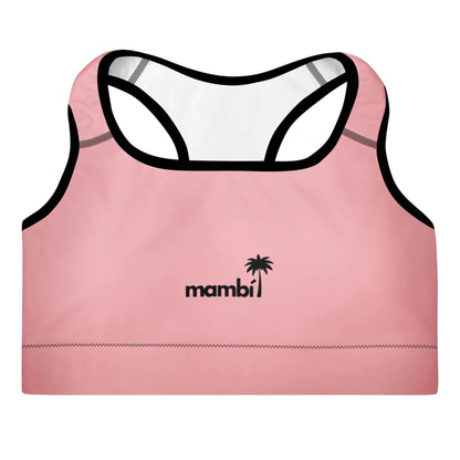 A pink sports bra with black trim, featuring the word Mambí and a small palm tree graphic printed in black on the front center. The background is white.