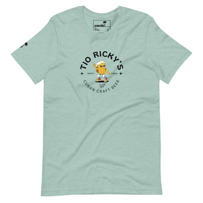 Light green T-shirt featuring a logo that reads Tio Rickys Cuban Craft Beer, with a cheerful Mambí beer mug character holding a Cuban flag and a small palm tree on the left sleeve.